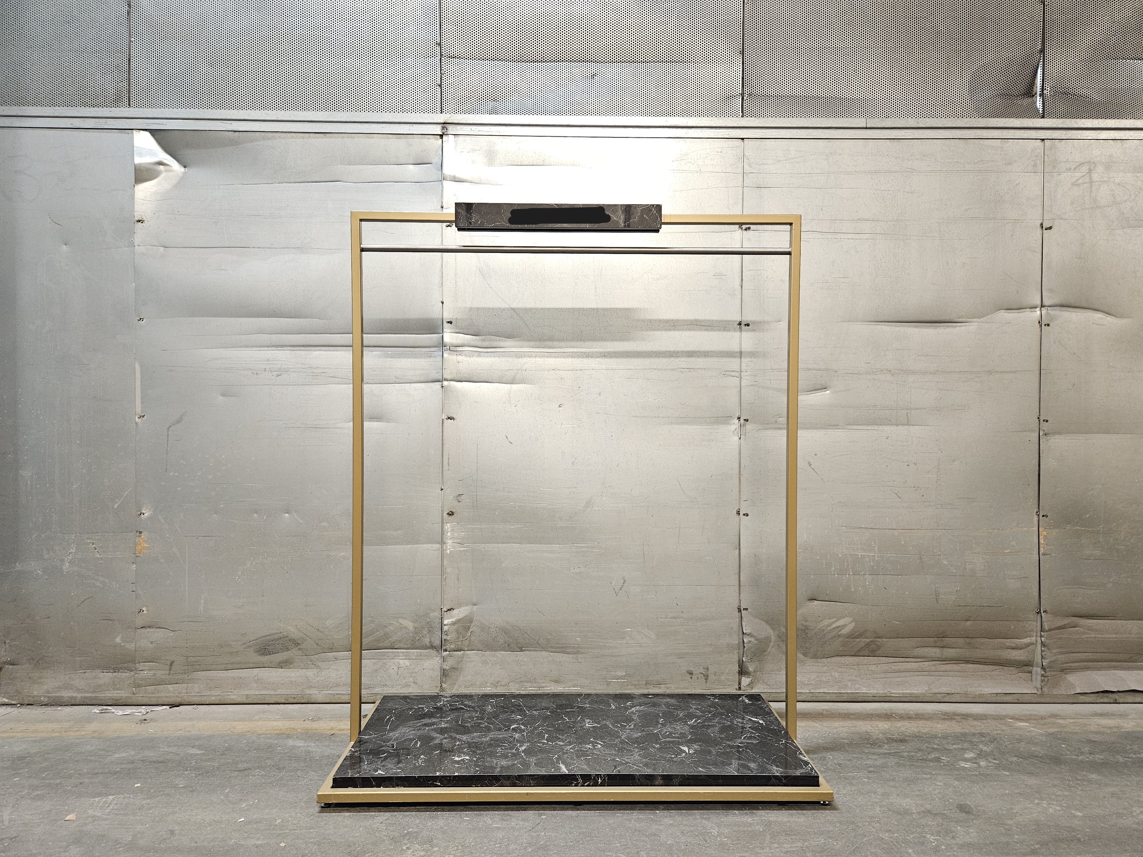Clothing rack marble look brass